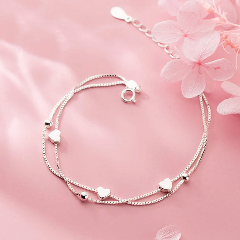 Evelisse - Armband med dubbla kedjor och små hjärtan
