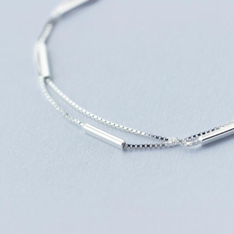 Katielle - Armband med dubbla kedjor i minimalistisk stil
